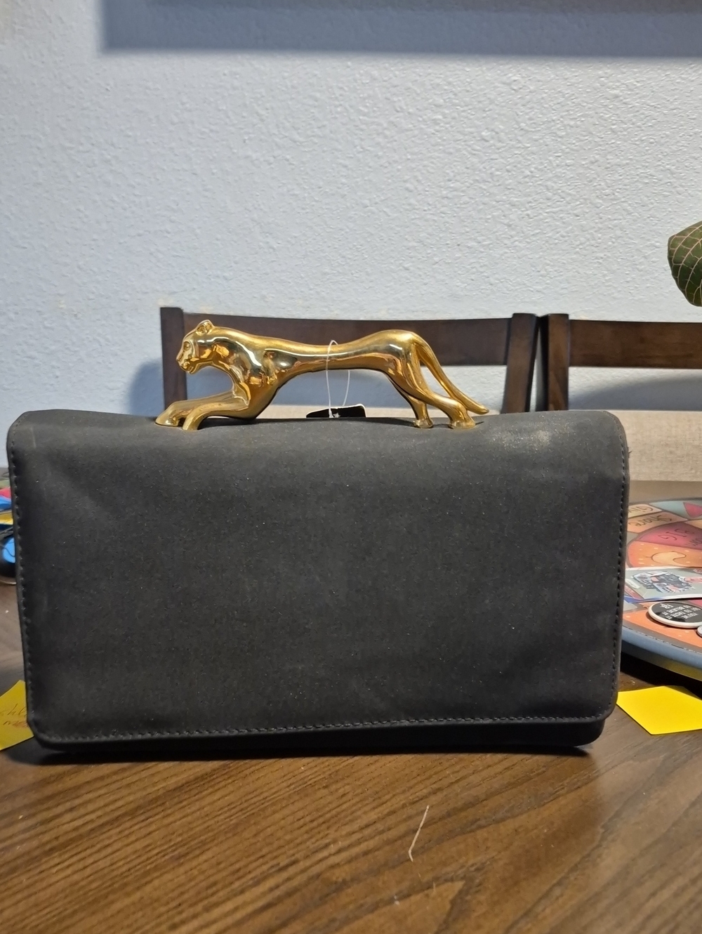 Ashley Stewart Black Clutch with Gold Panther Accent